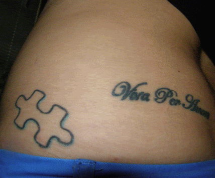 puzzle tattoos. arm tattoos puzzle piece. arm