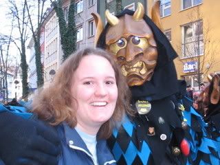 me (left) and a guy who then rubbed blue face pant on my nose