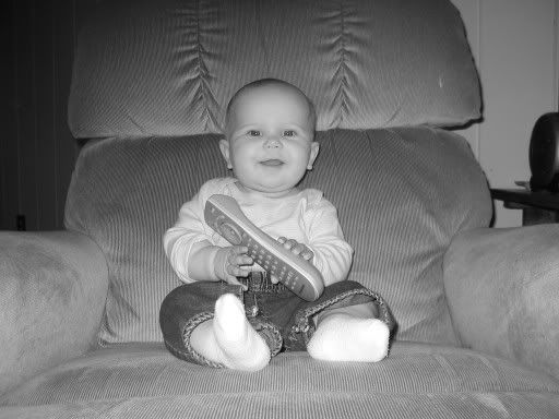 Anna and her favorite toy: the remote control