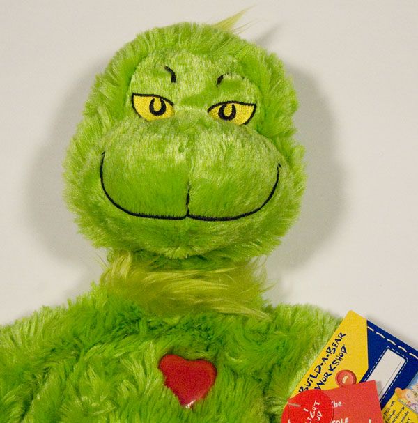 grinch plush gift set with removable santa suit