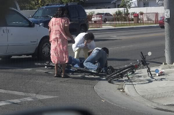 IMAGE: http://i17.photobucket.com/albums/b67/HerbD/Journalistic/BikerDown.jpg