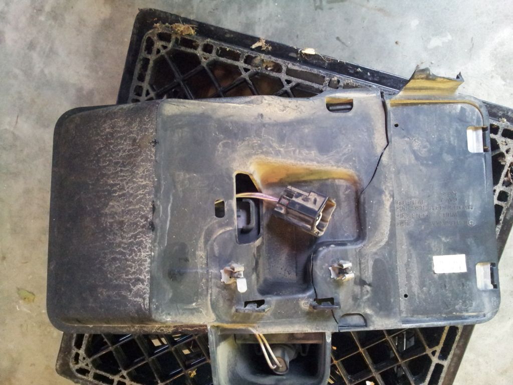 Broken license plate holder