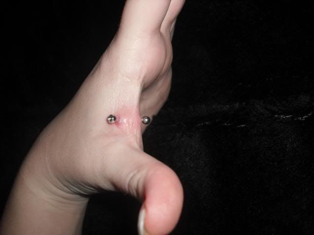 Hand web piercing