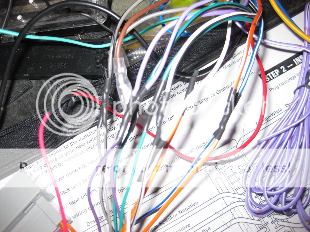 ?How to wire Clarion wiring harness to play DVDs while driving