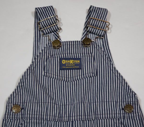 This is an absolutely adorable one piece overalls outfit from OshKosh 